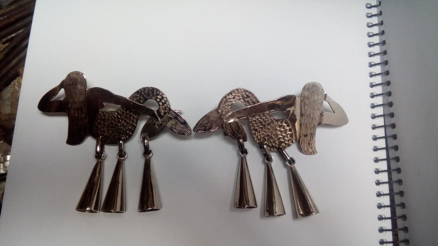 Rvtrill / Cheltuwe (prendedor)