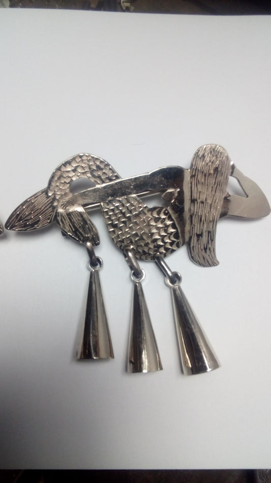 Rvtrill / Cheltuwe (prendedor)